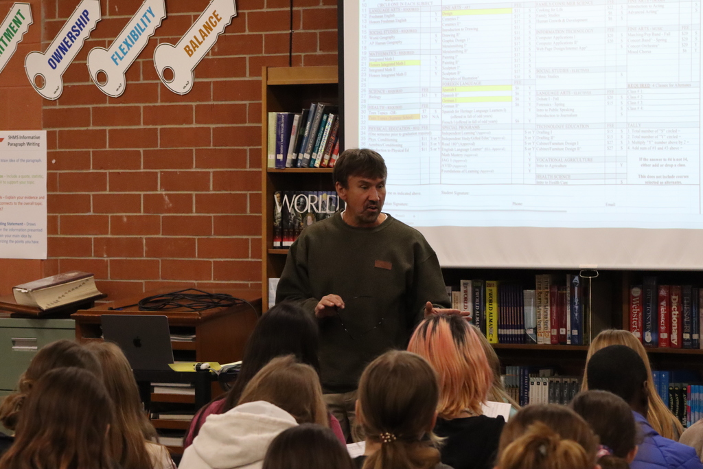 Mr. West speaking with 7th grade students.