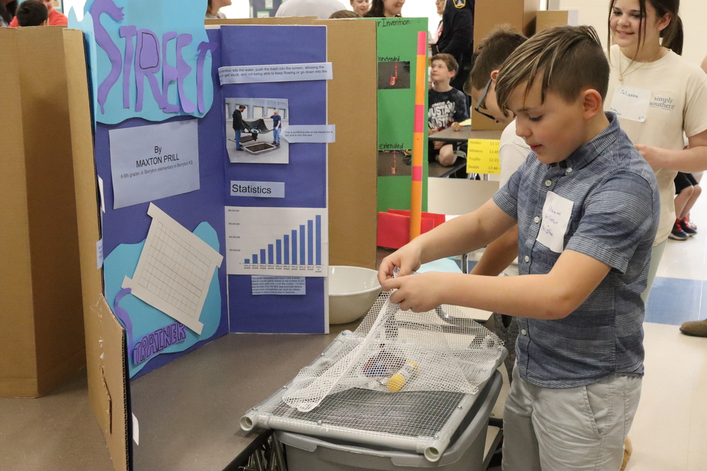 Student presenting at the Invention Convention at SHES.
