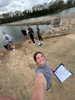 College Bio Class collecting water data.